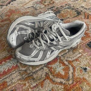 New Balance Metallic Silver Sneakers